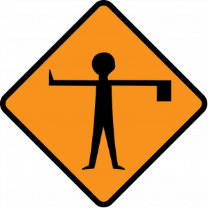 Flagman-ahead-irish road signs